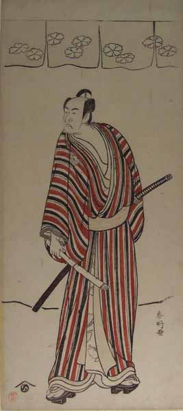 Actor in character holding flute and sword
